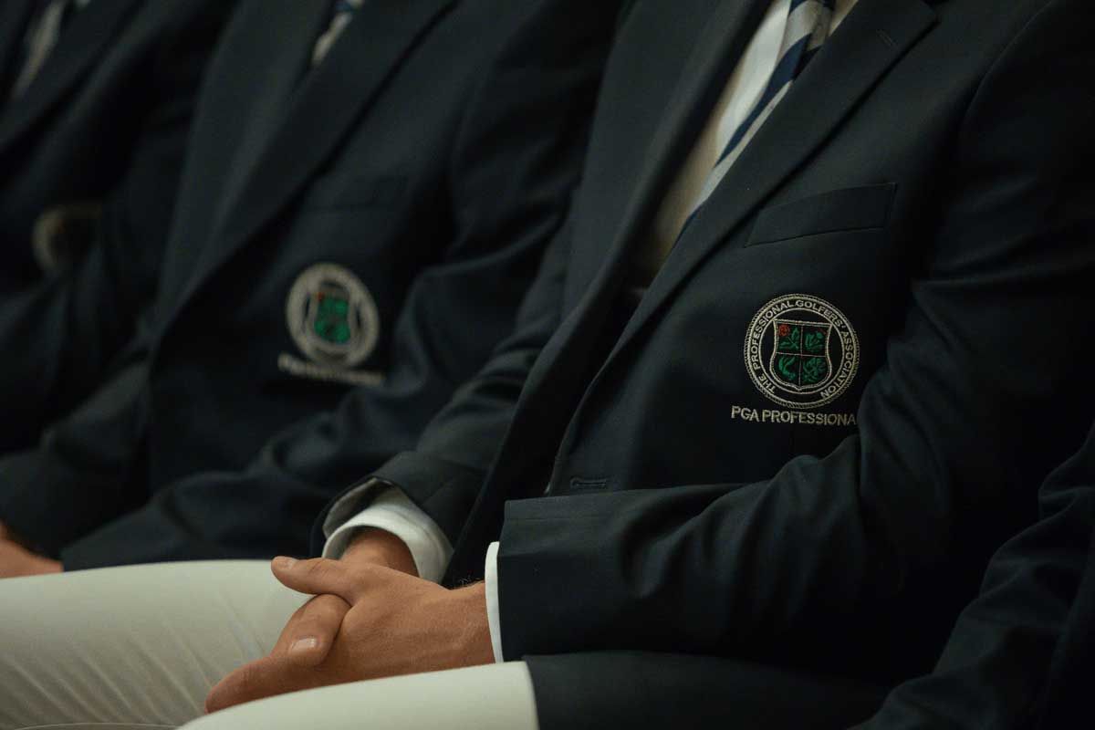 Graduation ceremony - crest on member blazer.png